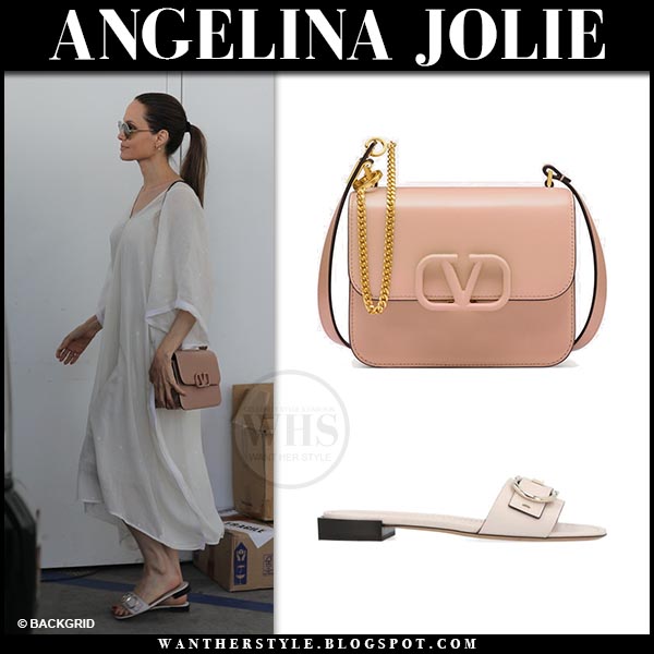 Angelina Jolie in white dress with beige shoulder bag and white buckle ...