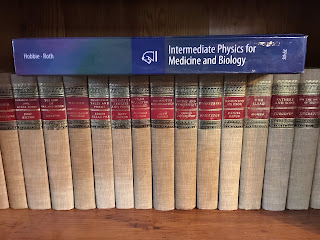 Part of my collection of Classic Club books, next to Intermediate Physics for Medicine and Biology.