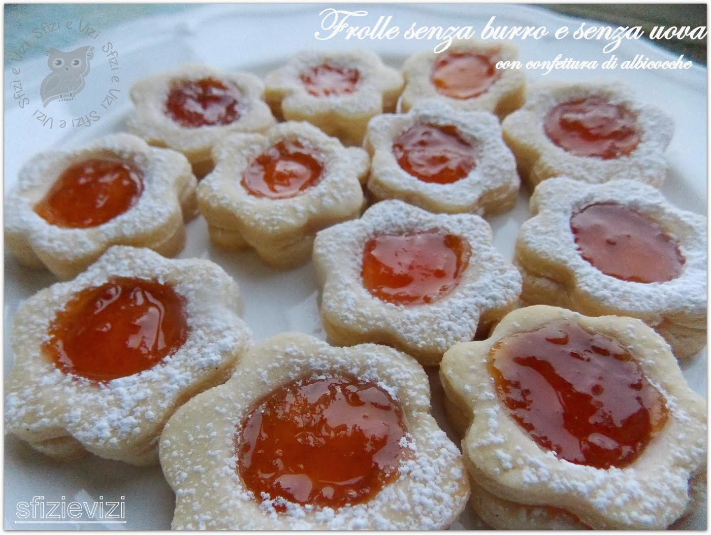 biscotti di pasta frolla senza burro e senza uova (a forma di cuore e farciti con confettura di albicocche)