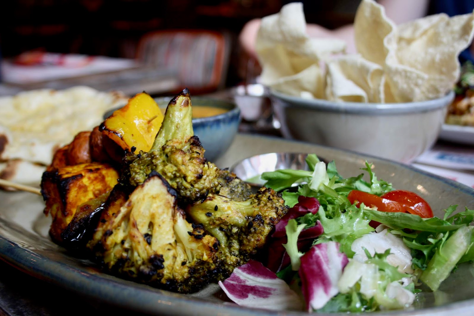 Veggie Heaven dish at Tamatanga, featuring achari broccoli