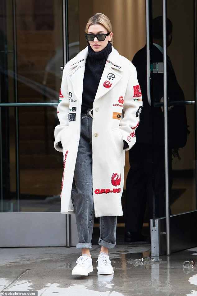 Hailey Bieber Wearing a white coat