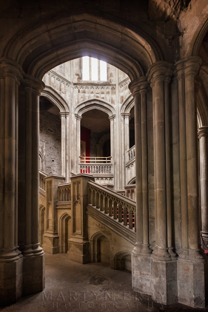 interior arch at Margam Castle and staircase by Martyn Ferry Photography