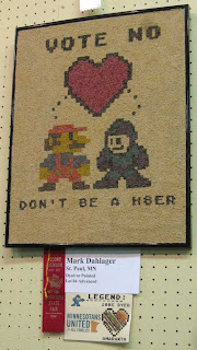 SuperMario and another game character below a heart, reading Don't be a H8ter