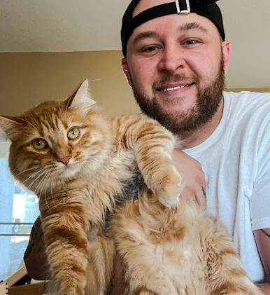 Ginger tabby helps guy recover from drug addiction