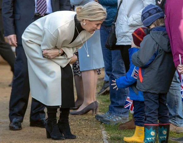 Countess of Wessex wore Prada wool coat and Victoria Beckham Tweed side drape midi skirt for visit Netley Hospital