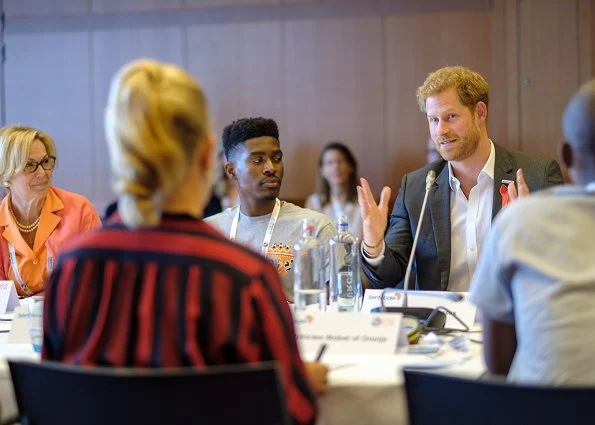 Princess Mabel of Orange-Nassau and Prince Harry, The Duke of Sussex attended the official opening of AIDS2018. Meghan Markle