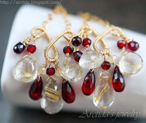 http://www.arctida.com/en/luxury/98-chandelier-earrings-citrine-amethyst-garnets-earrings-domani.html