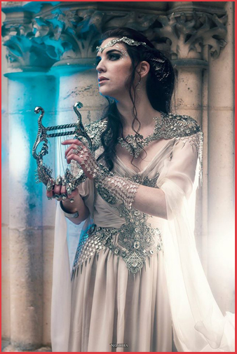 Photoshooting french medieval fashion woman dress armour jewellery Castle Camelot 