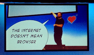 Photo of Tom Coates on stage, with speech bubble - internet does not mean browser