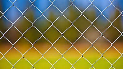 Desktop wallpaper with metal fence and iPhone Desktop wallpaper with metal fence and iPhone