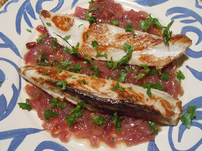 filetti di tonnetto  in agrodolce con cipolle rosse di tropea.