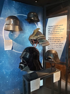 Darth Vader's helmet and its ancestors. 