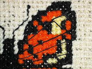 Detail of cross-stitch butterfly wing