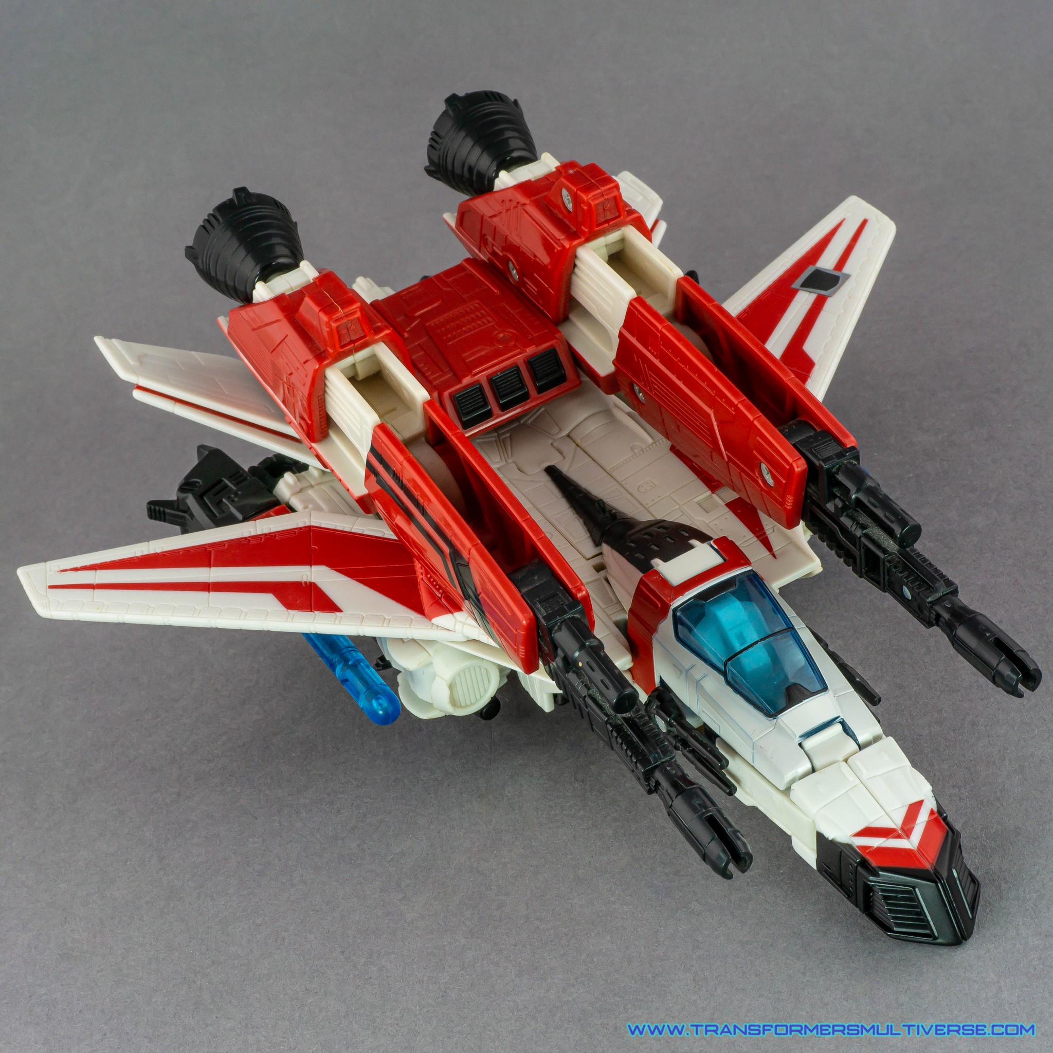 Transformers Classics Jetfire jet fighter mode with booster engines, weapons deployed