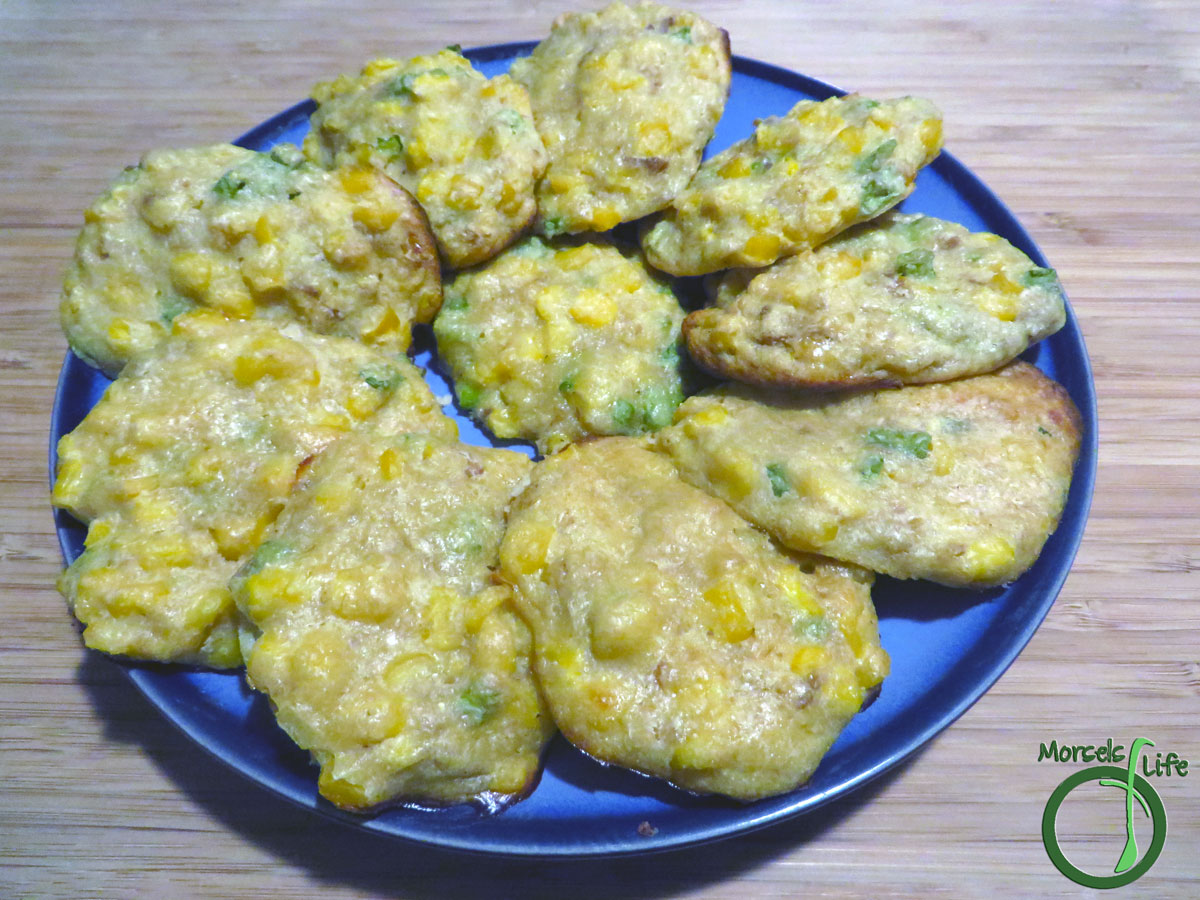 Morsels of Life - Baked Corn Fritters - Flavorful baked corn fritters made with caramelized onions and Parmesan cheese. Throw in some corn meal for extra texture!