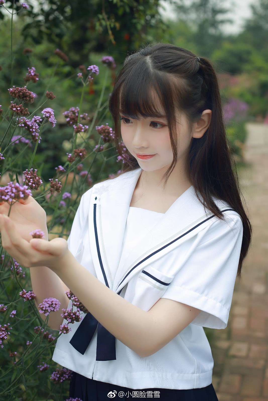 Chinese cute model - Little girl in the flower garden