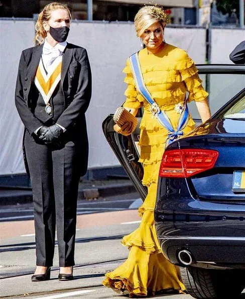 Queen Maxima wore a yellow dress from Claes Iversen Haute Couture SS17 collection. Bottega Veneta intrec knot clutch