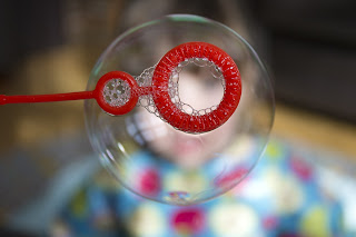 Picture of a bubble on a bubble wand