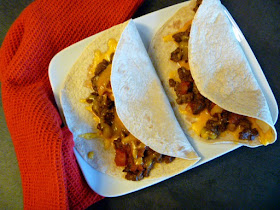 Simple Homemade Meximelts - a quick copykat recipe of a drive through favorite.  Perfect for Taco Tuesday! Slice of Southern