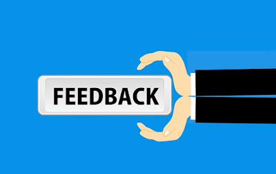 Feedback graphic of a hand holding banner