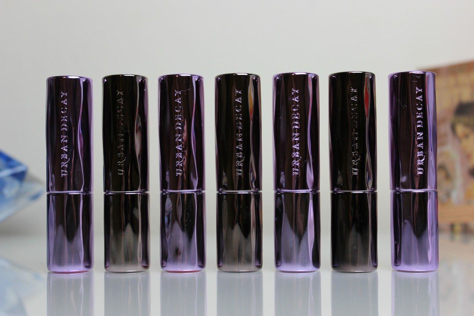 A picture of Urban Decay Revolution and Sheer Revolution Lipsticks