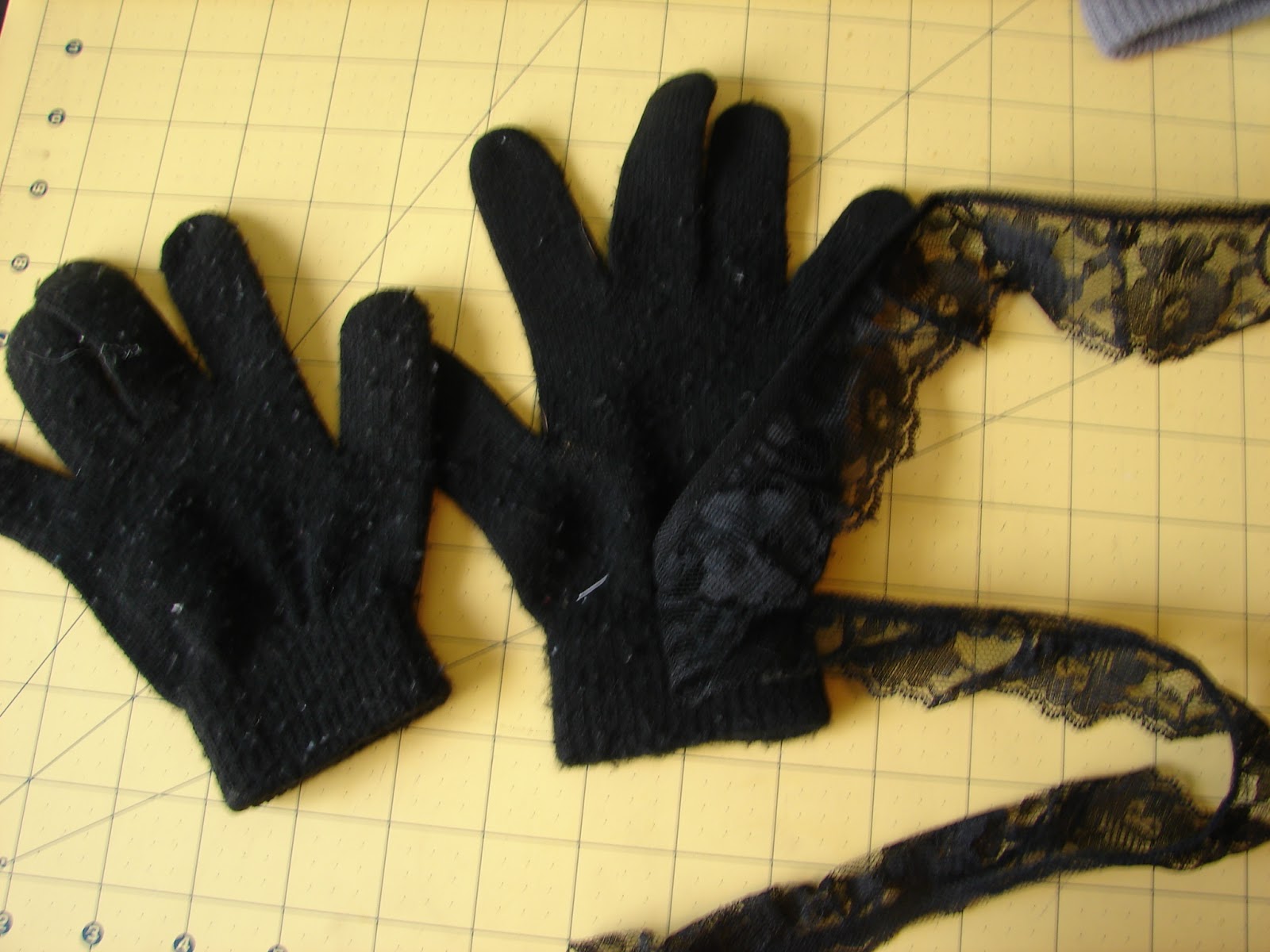 embellishing.....gloves that is. A girl and a glue gun
