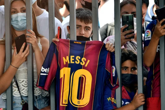 Lionel Messi fans outside stadium. Lionel Messi fans outside stadium.