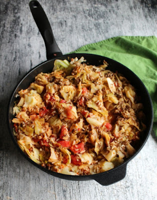 Get the flavor of cabbage rolls without the work! Un-stuffed cabbage casserole is a quick and easy one pan dinner that makes cabbage roll goodness possible on a weeknight! swiss diamond saute pan filled with cabbage roll casserole