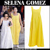 Selena Gomez in yellow maxi dress and sneakers in Italy on July 24