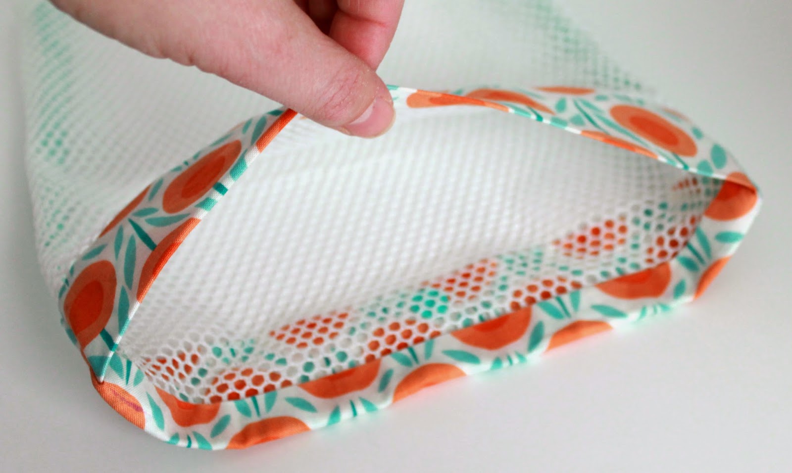 Simple Mesh Bag Tutorial: great for produce or organizing! | Step by step directions how to sew a mesh bag with a simple fold-over closure, no zipper. | The Inspired Wren