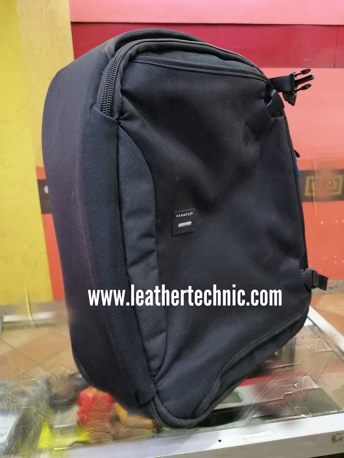 Crumpler bag repair, luggage wheel replacement, backpack stitching
