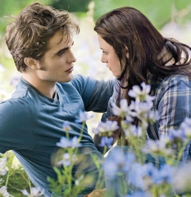 Edward and Bella among the flowers in Twilight Saga: Eclipse 2010 movieloversreviews.filminspector.com