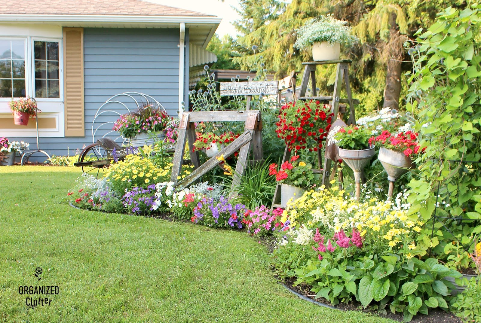 The Front Yard Flower Border 2012-2020 - Organized Clutter