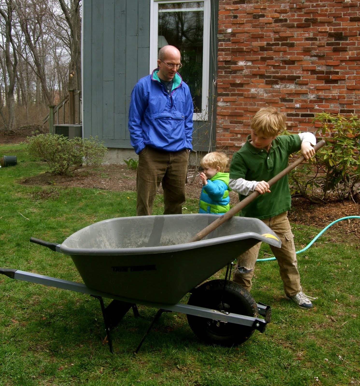 Their eldest son got a turn mixing the cement.