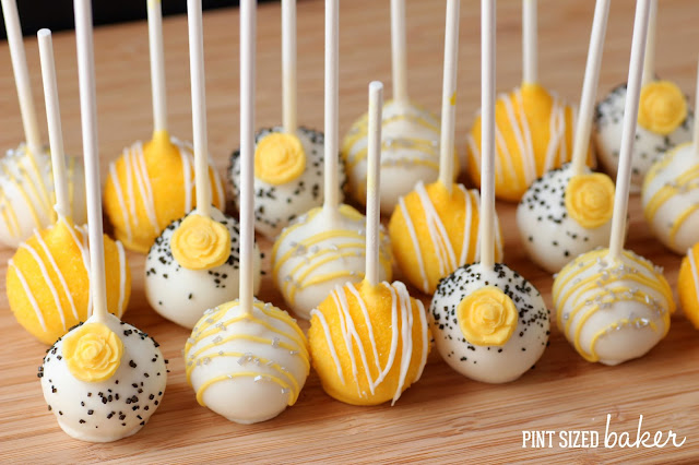 Rose Cake Pops and simply striped cake pops are stunning on a dessert table.