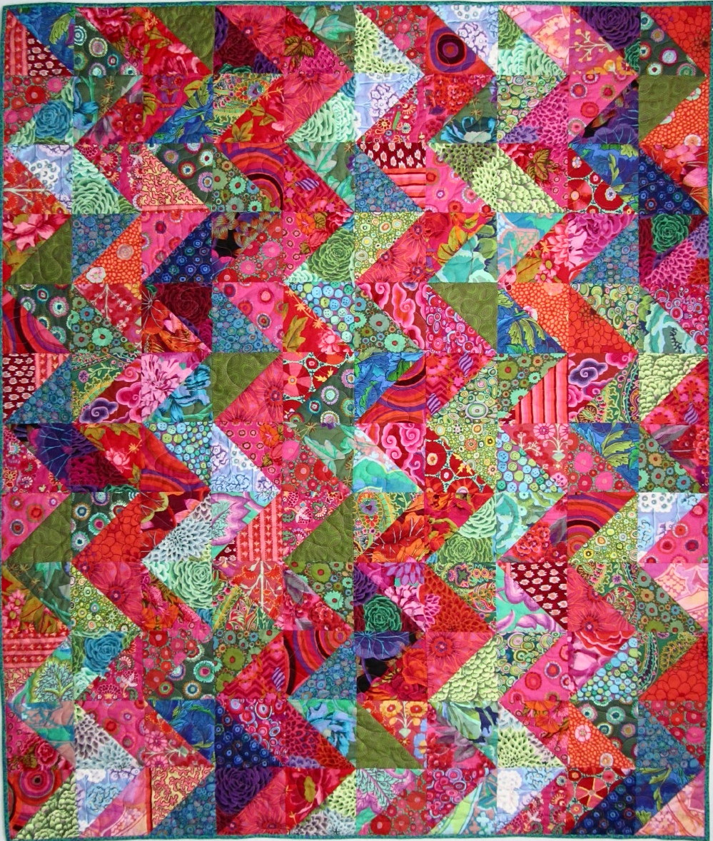 Exuberant Color Quilts made with triangles