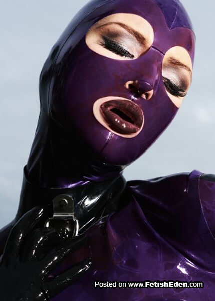 Purple latex hood on lady's head