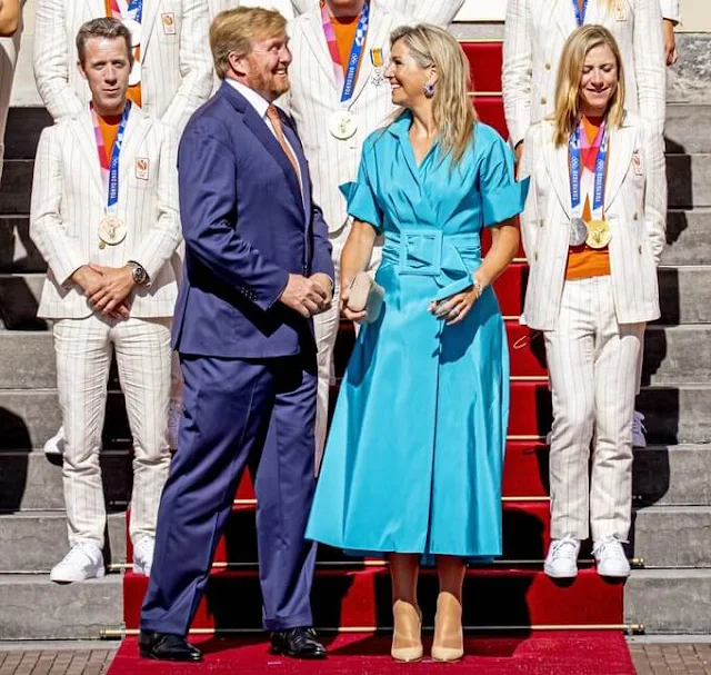 Queen Maxima wore a blue Taffeta satin dress from Natan. King Willem-Alexander and Queen Maxima held a reception at Noordeinde Palace