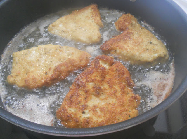 Browning the chicken breasts for chicken Parmesan