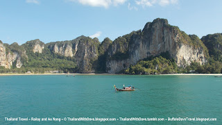 Railay - longtail boat in front of cliffs and beaches Railay west