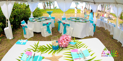 wedding reception with tent with blue and pink as wedding themes