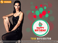 bold and beautiful picture tuba buyukustun in black dress and showing off her sleekly legs