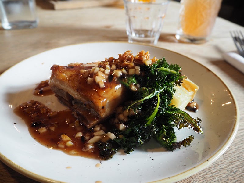 Braised pork belly dish with kale