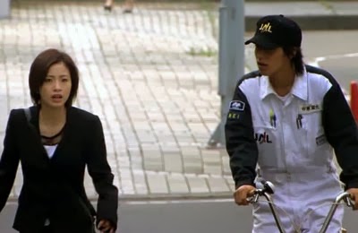 Nishikido Ryo as Nakahara approaches Misaki on a bicycle.