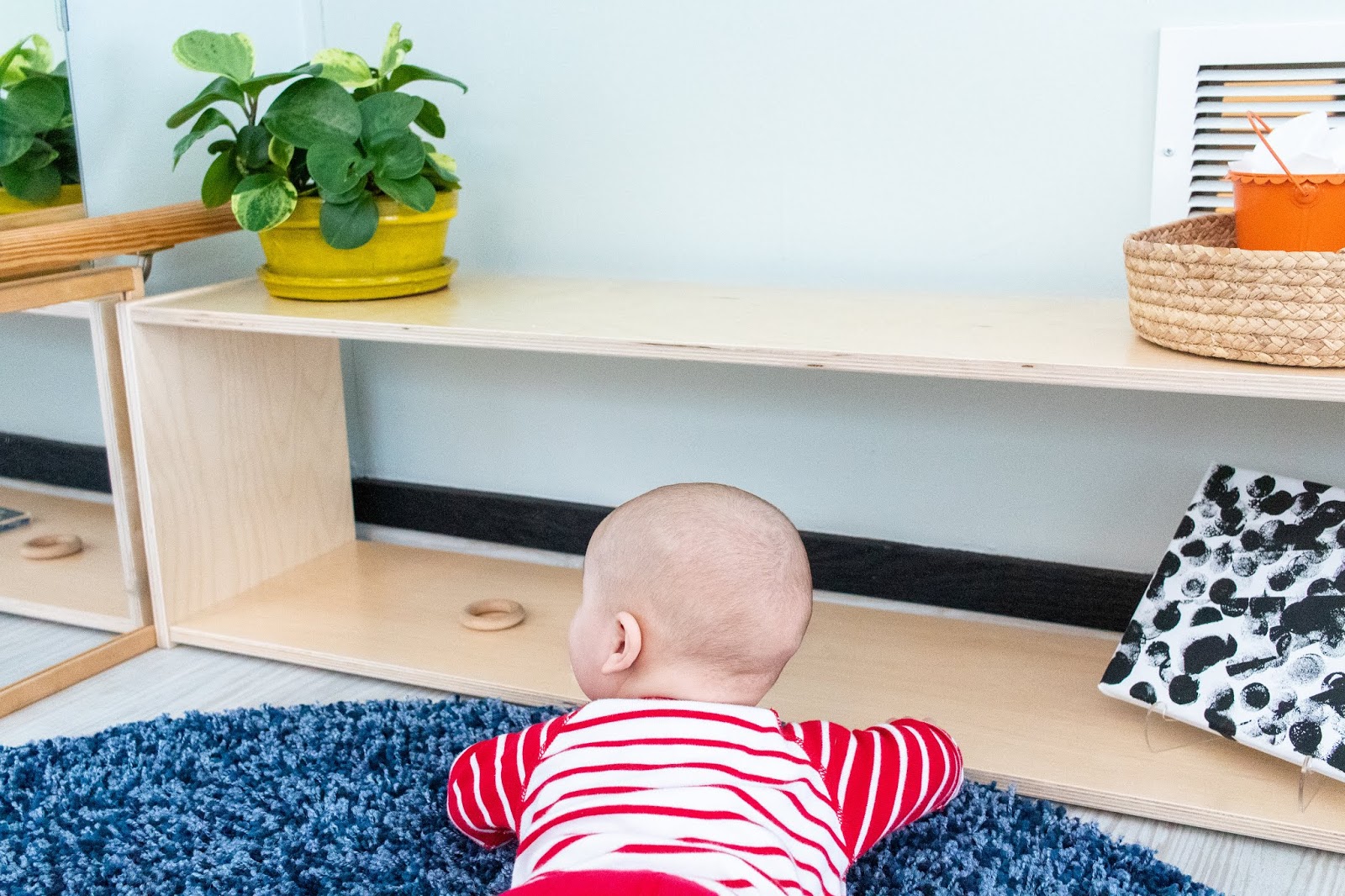 Montessori Baby Using an Infant Shelf