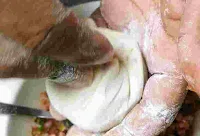 Stuffed and sealed onion kulcha dough ball