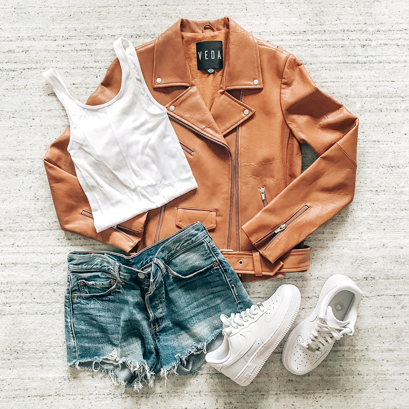Daily Style Finds: New White Sneakers, 501 Levi's Shorts + Leather Jacket