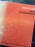 Electricity and Magnetism, Volume 2 of the Berkeley Physics Course, by Edward Purcell, superimposed on Intermediate Physics for Medicine and Biology.