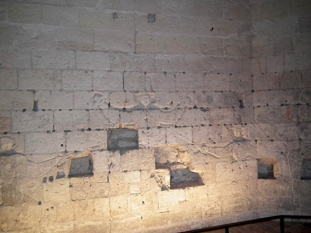 16C graffiti by Protestant soldiers, Loches, Indre et Loire, France. Photo by Loire Valley Time Travel.