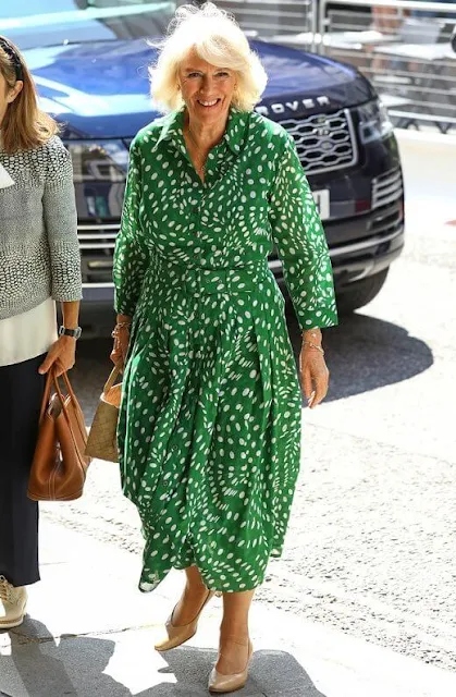 The Duchess wore a new ivy green floral print audrey drapery dota dress from Samantha Sung